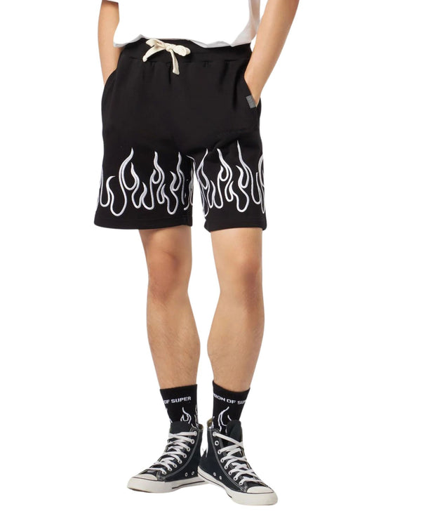 BLACK SHORTS WITH EMBROIDERED WHITE FLAMES AND METAL LABEL
